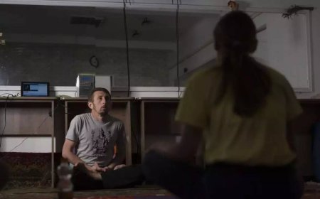 Yoga in a basement helps people in a Ukrainian front-line city cope with Russia's constant shelling