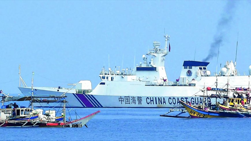 Philippines vows removal of Chinese barriers at disputed reef