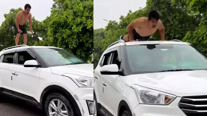 Reckless stunt: Man does push-ups on moving SUV