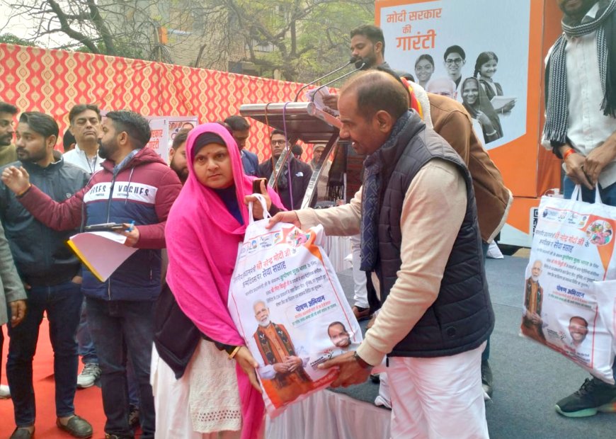 MP Ramesh Bidhuri distributing nutrition kits during the Viksit Bharat Sankalp Yatra