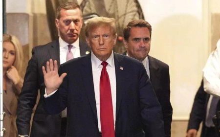 Trump returns to campaign facing a warning of jail time if he violates a trial gag order