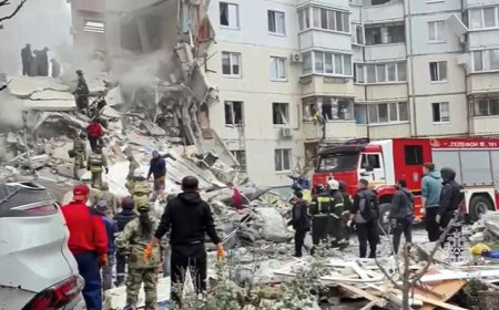 Apartment building partially collapses in a Russian border city after shelling, several killed