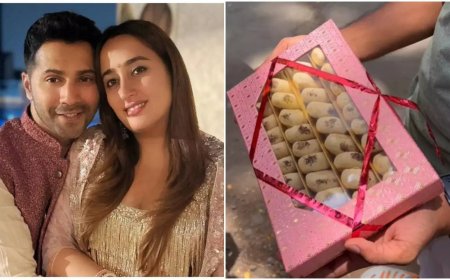 Varun Dhawan's staff treats paps with sweets