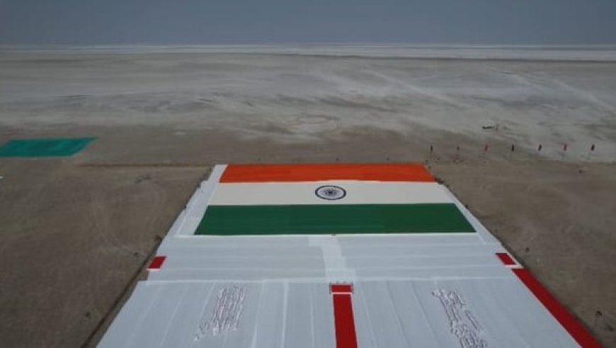 Grand display of the world's largest Khadi tricolor in the Rann of Kutch on the 77th Republic Day.